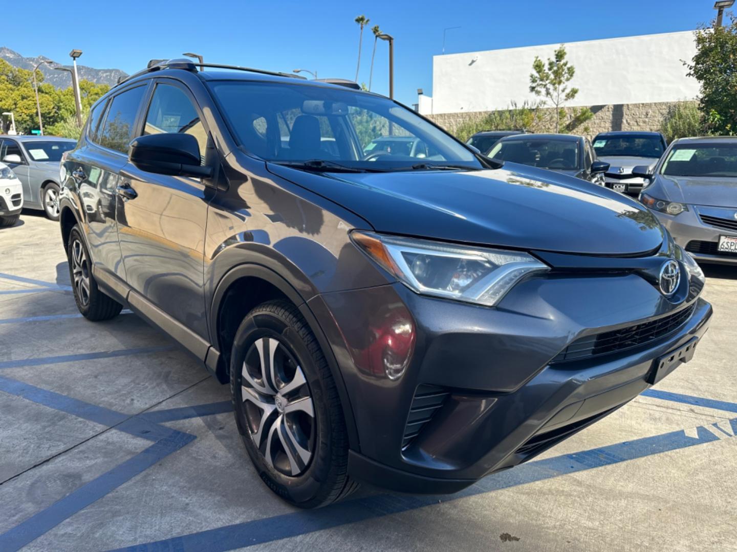 2016 Gray /Black Toyota RAV4 (JTMZFREVXGJ) , AUTOMATIC transmission, located at 30 S. Berkeley Avenue, Pasadena, CA, 91107, (626) 248-7567, 34.145447, -118.109398 - Crown City Motors is a used “Buy Here Pay Here” car dealer in Pasadena CA. “Buy Here Pay Here” financing, means that when you purchase your vehicle from our dealership, that you make the payments to the dealership as well. We do not need the banks approval to get you approved for a used auto - Photo#7